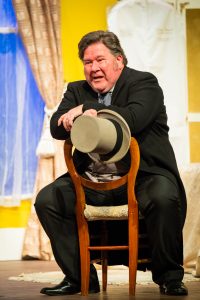 Actors from Giffnock Theatre Players performing the stage play - Plaza Suite by Neil Simon